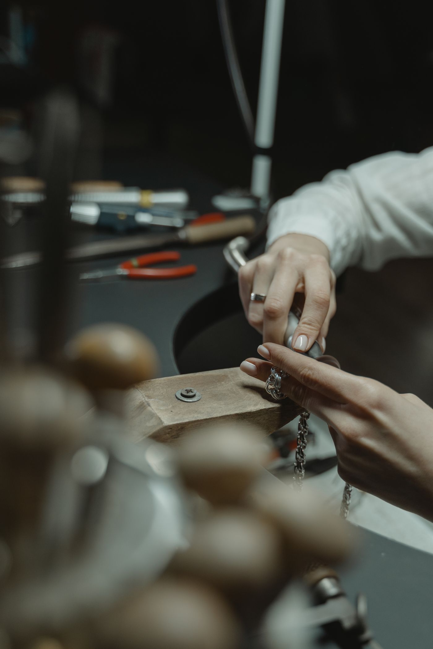 A Mira Gems artisan hand-finishing a piece at the Surat workshop